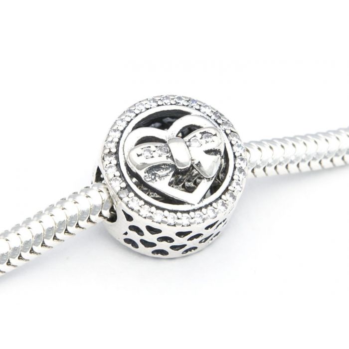 Srebrna zawieszka Charms serce z kokardką Srebrna zawieszka Charms serce z kokardką